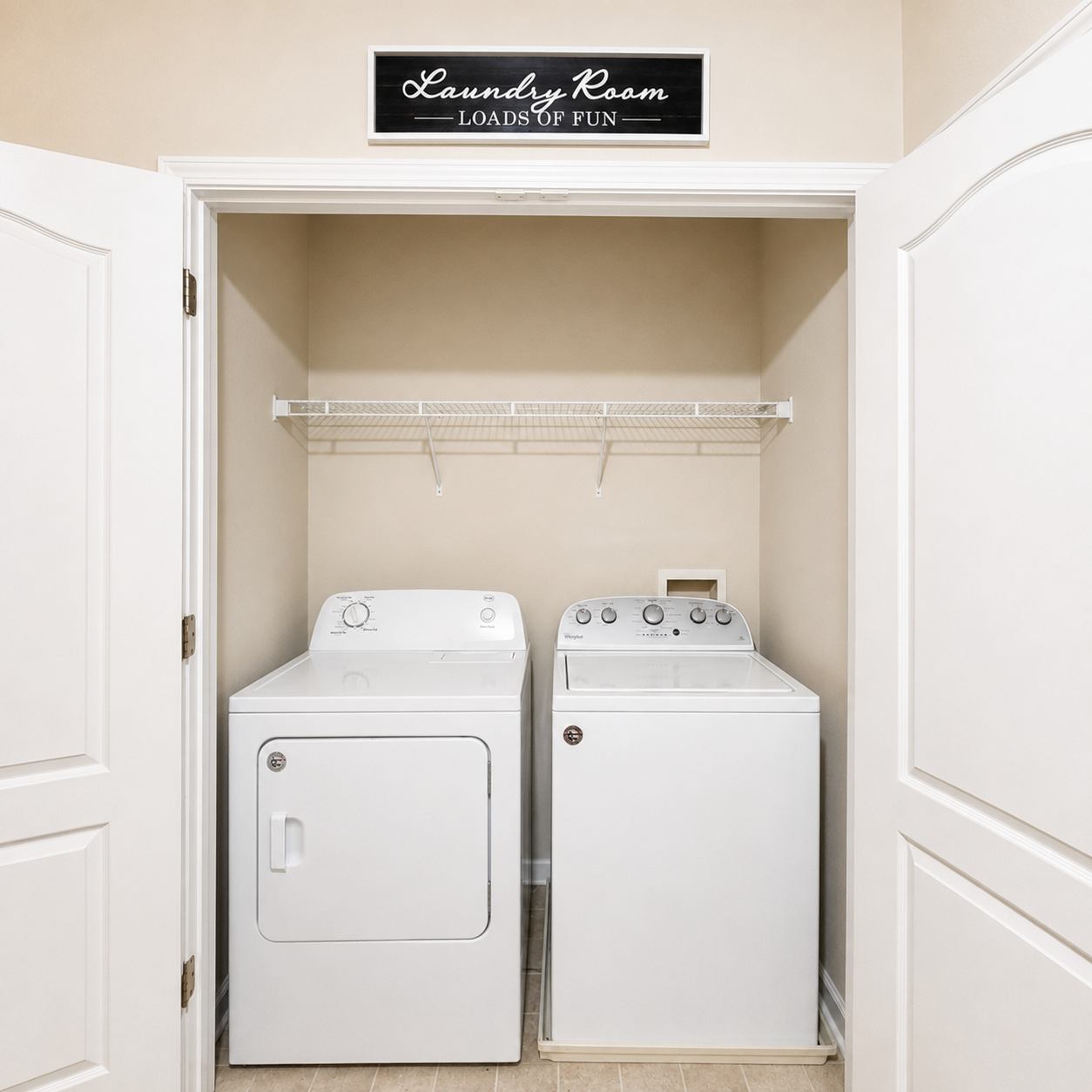 Bright laundry area with a washer and dryer